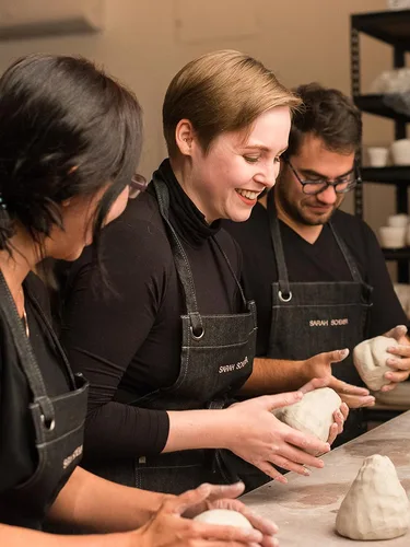 potters enjoying a group workshop